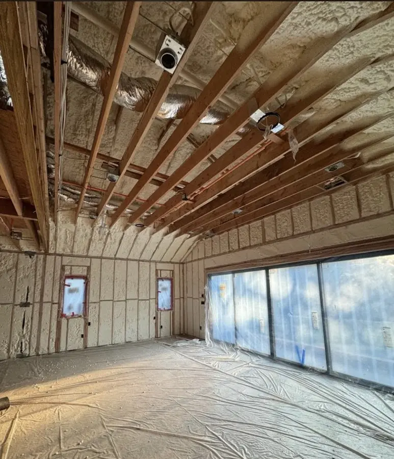 Interior walls and ceiling insulated with spray foam during new construction in Lauderhill